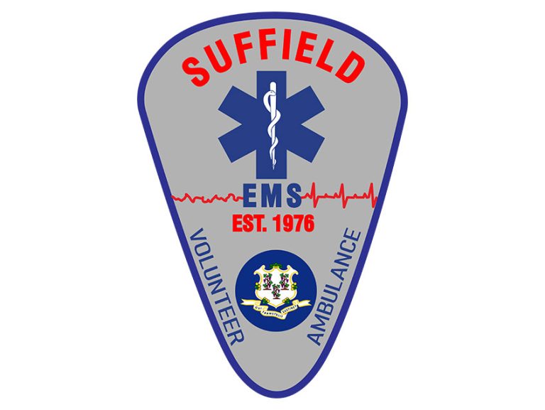 A badge-shaped logo with the words "Suffield Volunteer Ambulance EMS Est. 1976," featuring a Star of Life symbol, red heartbeat line, and the Connecticut state seal on a gray background.